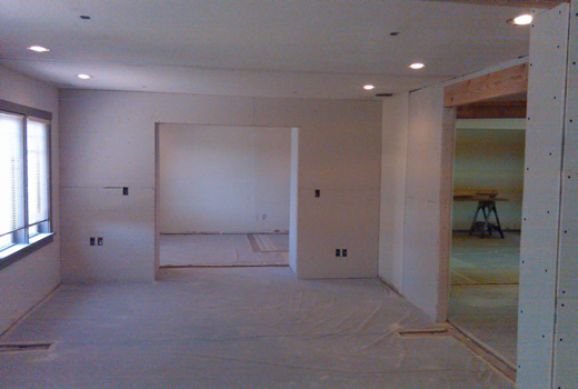 Facing the opening to the conference room.